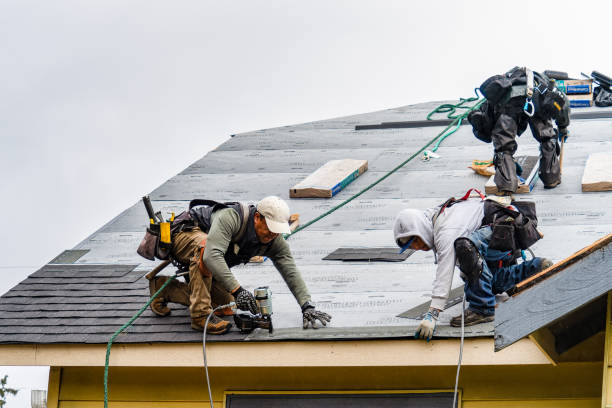 Professional Gutter Installation technician working in Woodhaven, NY